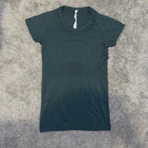 Dark green Lululemon athletic top